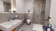 2-Zimmer-Obergeschosswohnung mit Balkon und EBK - Haus 2 OG 4.1 - Modernes Badezimmer.jpg